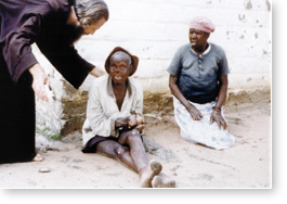 John with two Mutemwa residents